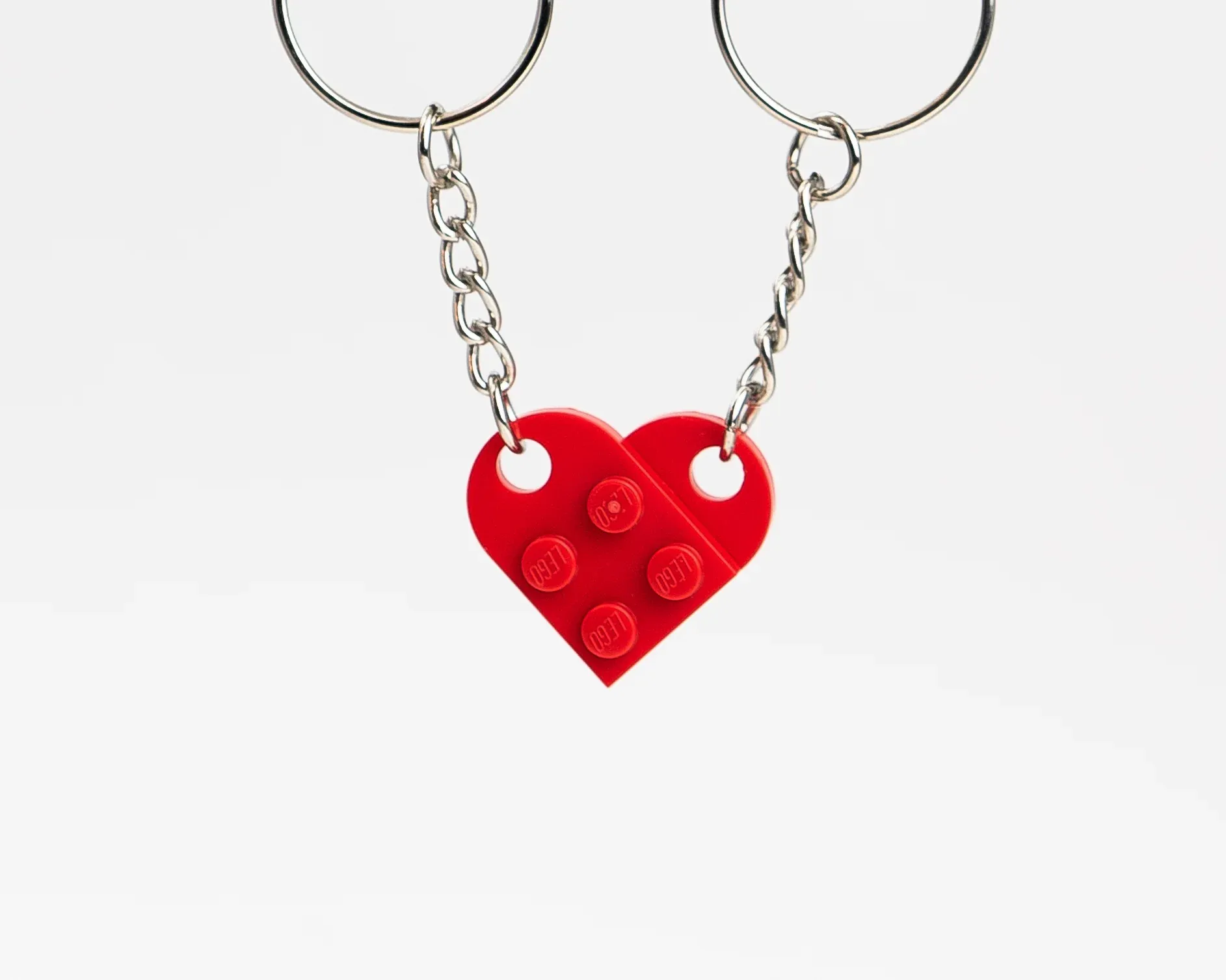 product image of a lego matching heart keychain, red colored